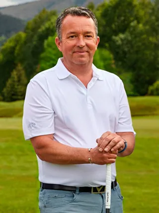 Adrian Hubert — trener golfa